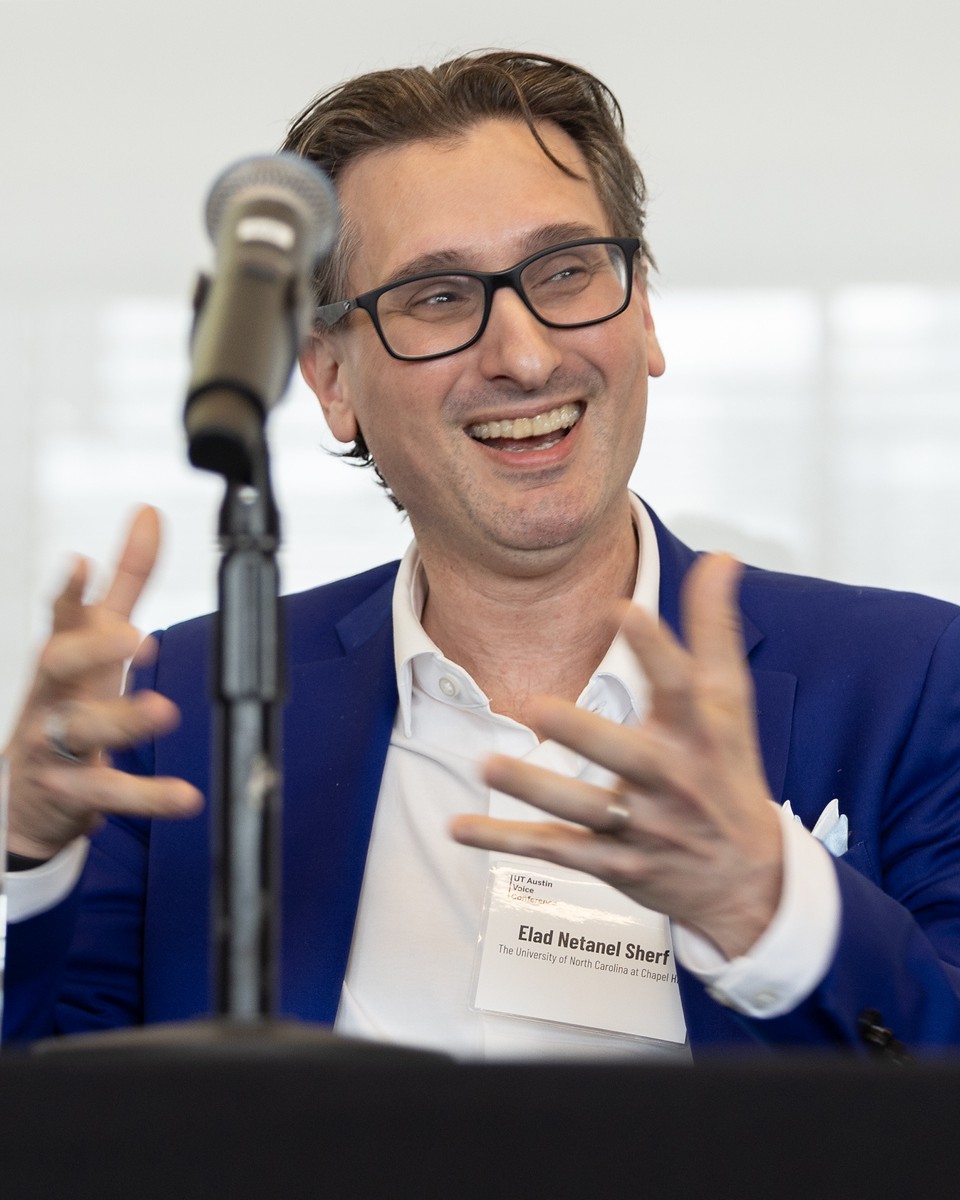 Elad Sherf speaking on a panel.